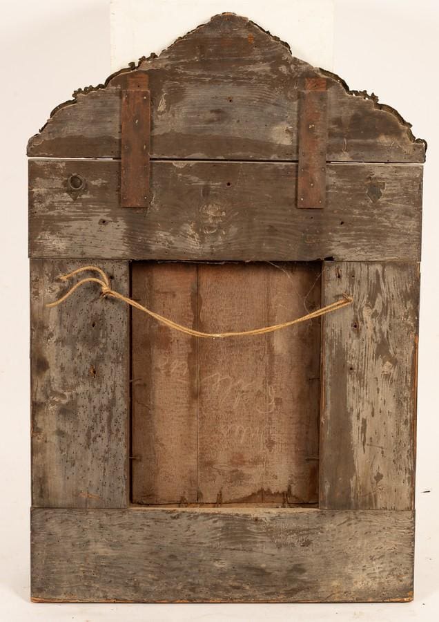 Flemish Wall Mirror backside showing aged wood and hanging rope with ornate carved top and metal brackets.