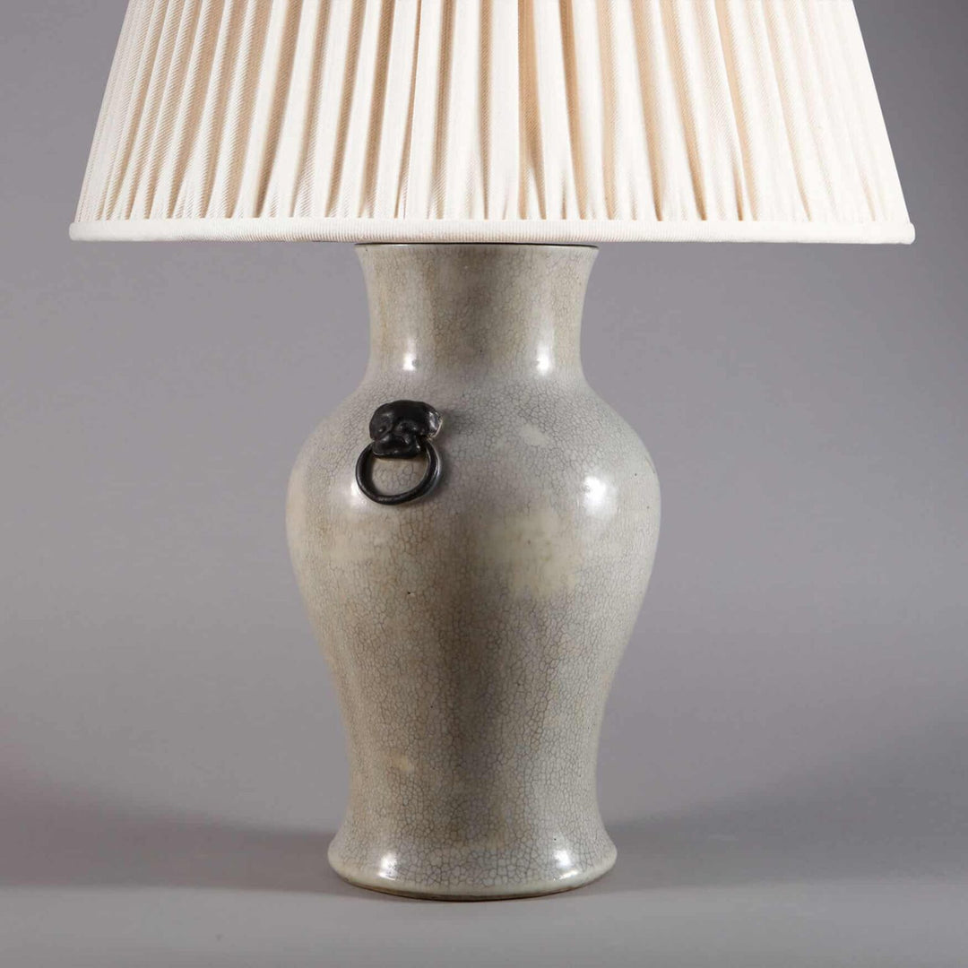 Chinese Crackle Glazed Vase Mounted as a Table Lamp with grey crackle glaze and decorative metal ring handle.