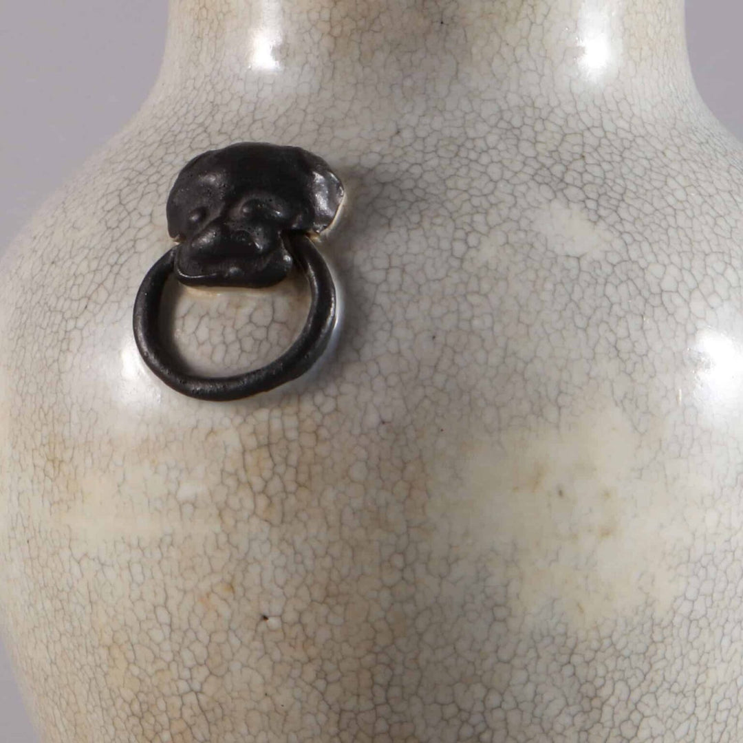 Chinese Crackle Glazed Vase Mounted as a Table Lamp with crackled glaze and decorative metal ring detail, circa 1900 China.
