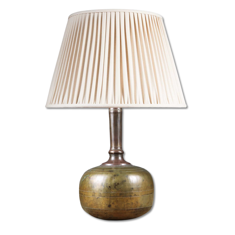 Rajasthani brass water bottle as a Table Lamp with a pleated cream lampshade, antique Indian decor circa 1850.