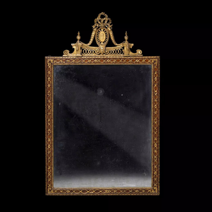 Neo Classical late 18th Century Parcel-gilt Pier Mirror with gilt strapwork and Roman Emperor medallion, Sweden circa 1800.