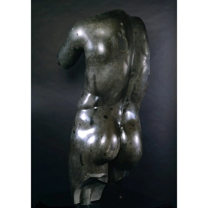Black Basalt Statue ‘The Scraper’ Torso after Lysippos Apoxyomenos, life-sized classical black basalt figure.