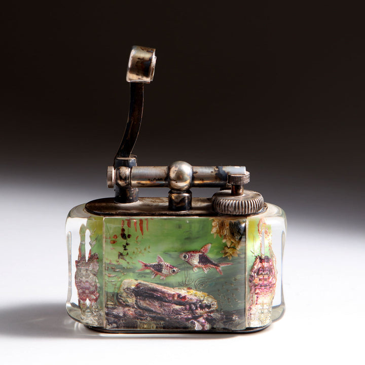 Dunhill Aquarium Table Lighter with scalar fish design in lucite by Collection JA10, mid-century British vintage piece.