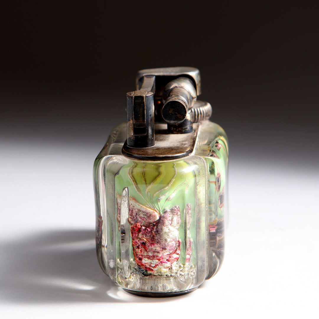 Vintage Dunhill Aquarium Table Lighter with scalar fish design in lucite by Collection JA10, mid-century British craftsmanship