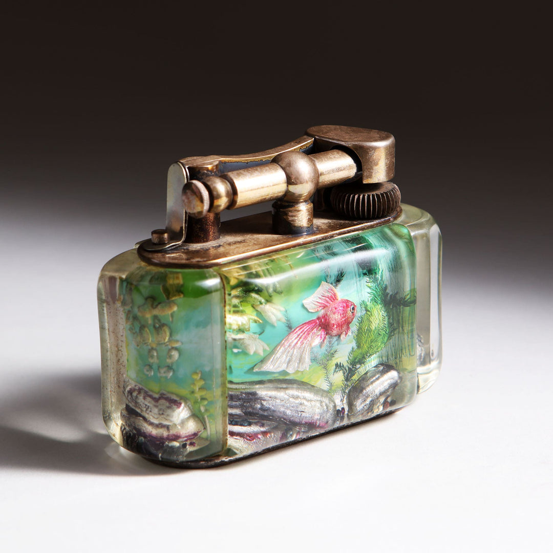 Vintage Dunhill Aquarium table lighter with marine motifs and brass details from Collection JA10, English mid-century design.