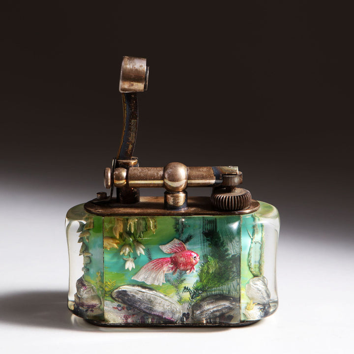 Dunhill Aquarium Table Lighter with detailed marine intaglio panels, brass body, vintage style from Collection JA10.
