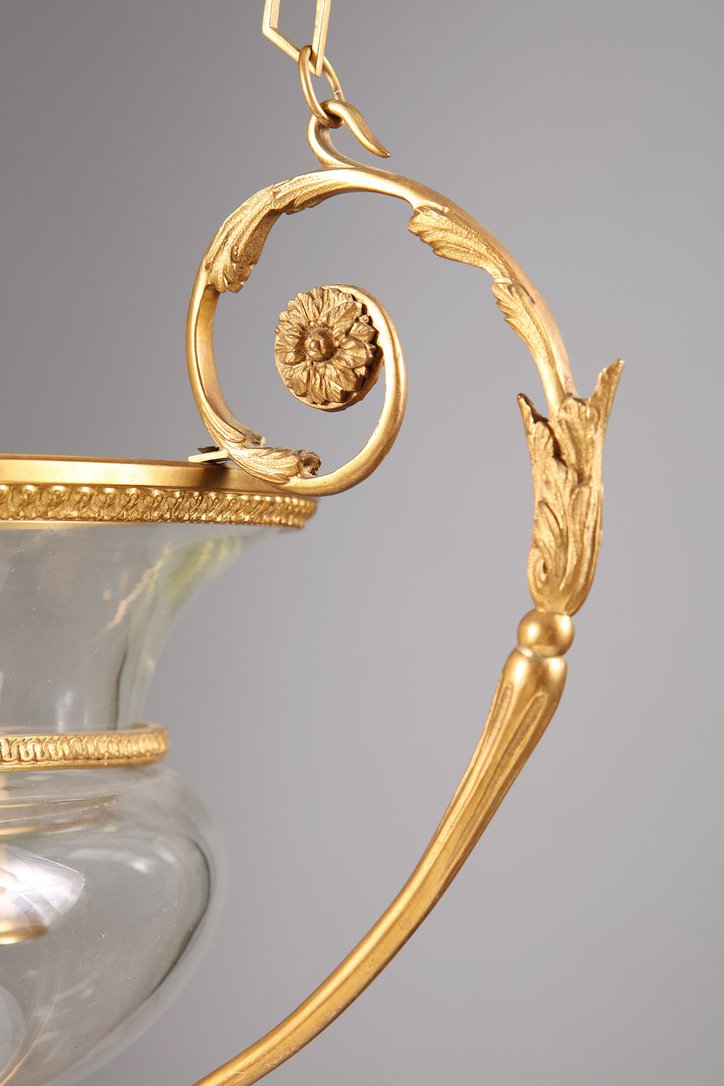 A mid century gilt bronze and glass pendant glass lantern
