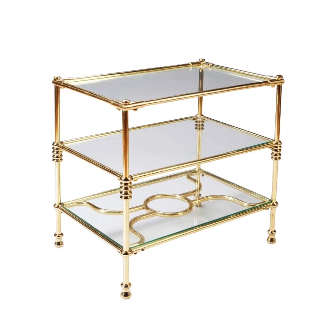 A Three Tiered Brass Art Deco Etagere with glass shelves and decorative ring column supports circa 1930.