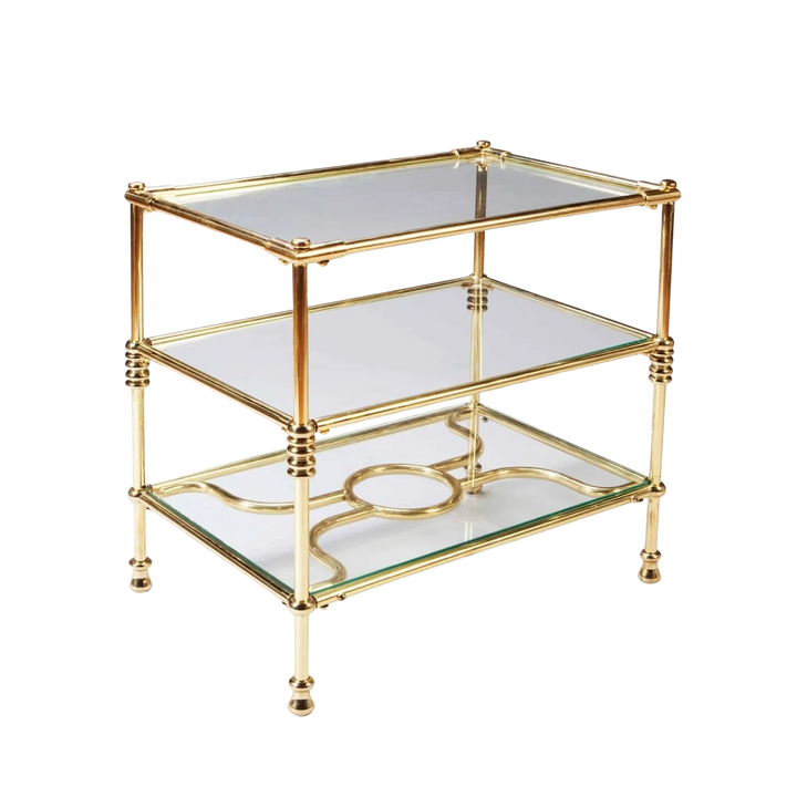 A Three Tiered Brass Art Deco Etagere with glass shelves and decorative ring column supports circa 1930.