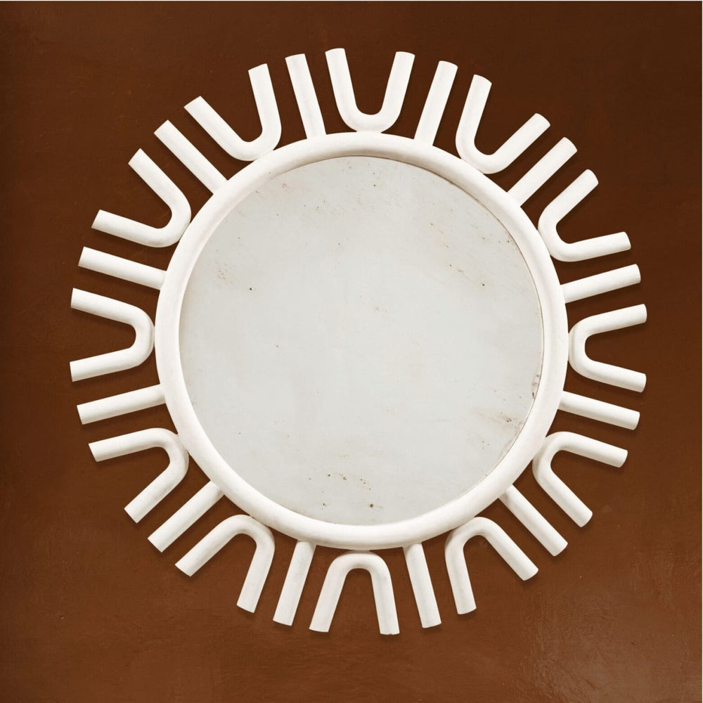 A large white-painted mirror designed by Andrew Allfree with a unique sunburst frame, diameter 160 cms.