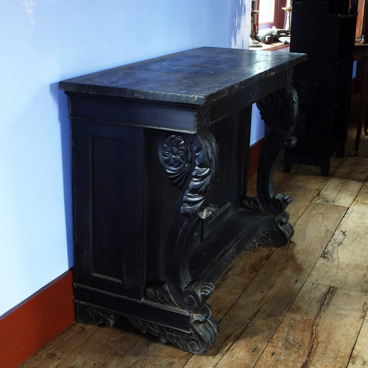 Anglo Indian Ebonised Console Table side cabinet with veined marble top and carved floral and scroll details circa 1850.