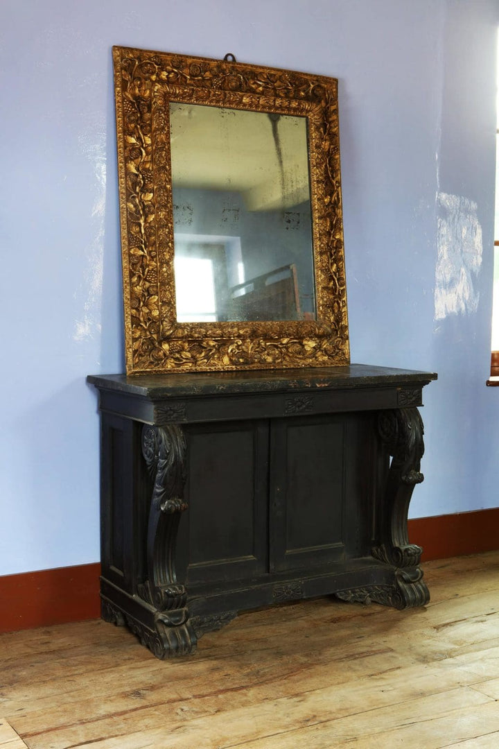 Anglo Indian Ebonised Console Table side cabinet with carved volute scrolls and floral marble top circa 1850.
