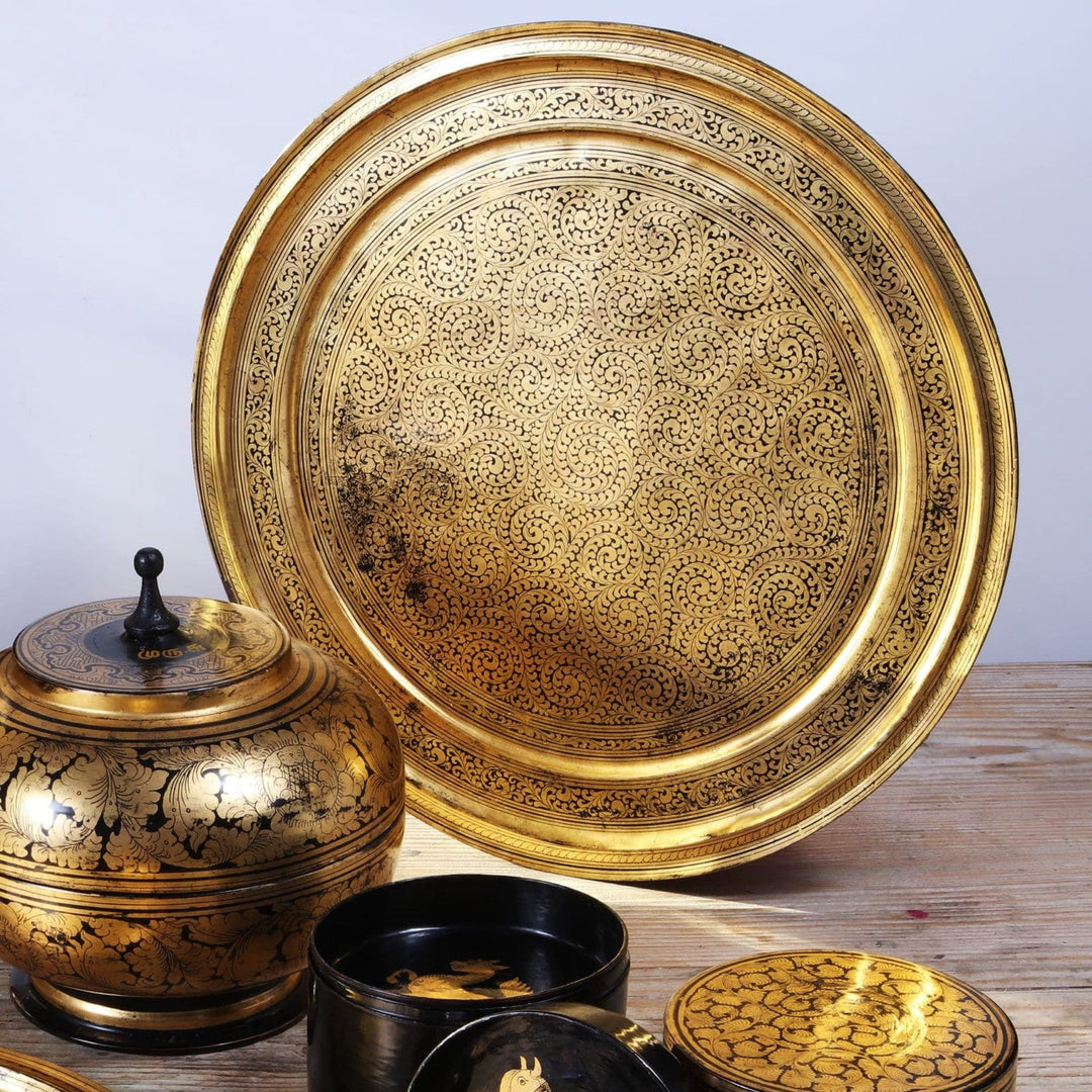 A Collection of Burmese Gilt Lacquer Trays and Objects