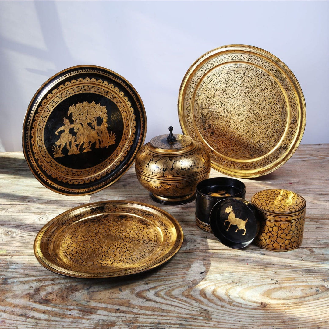 A Collection of Burmese Gilt Lacquer Trays and Objects