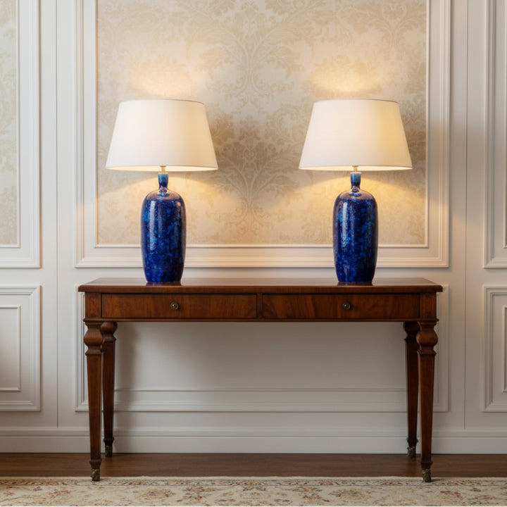 Pair of hand-crafted cobalt blue crystalline glazed ceramic table lamps on wooden table by Nicholas Wells Antiques