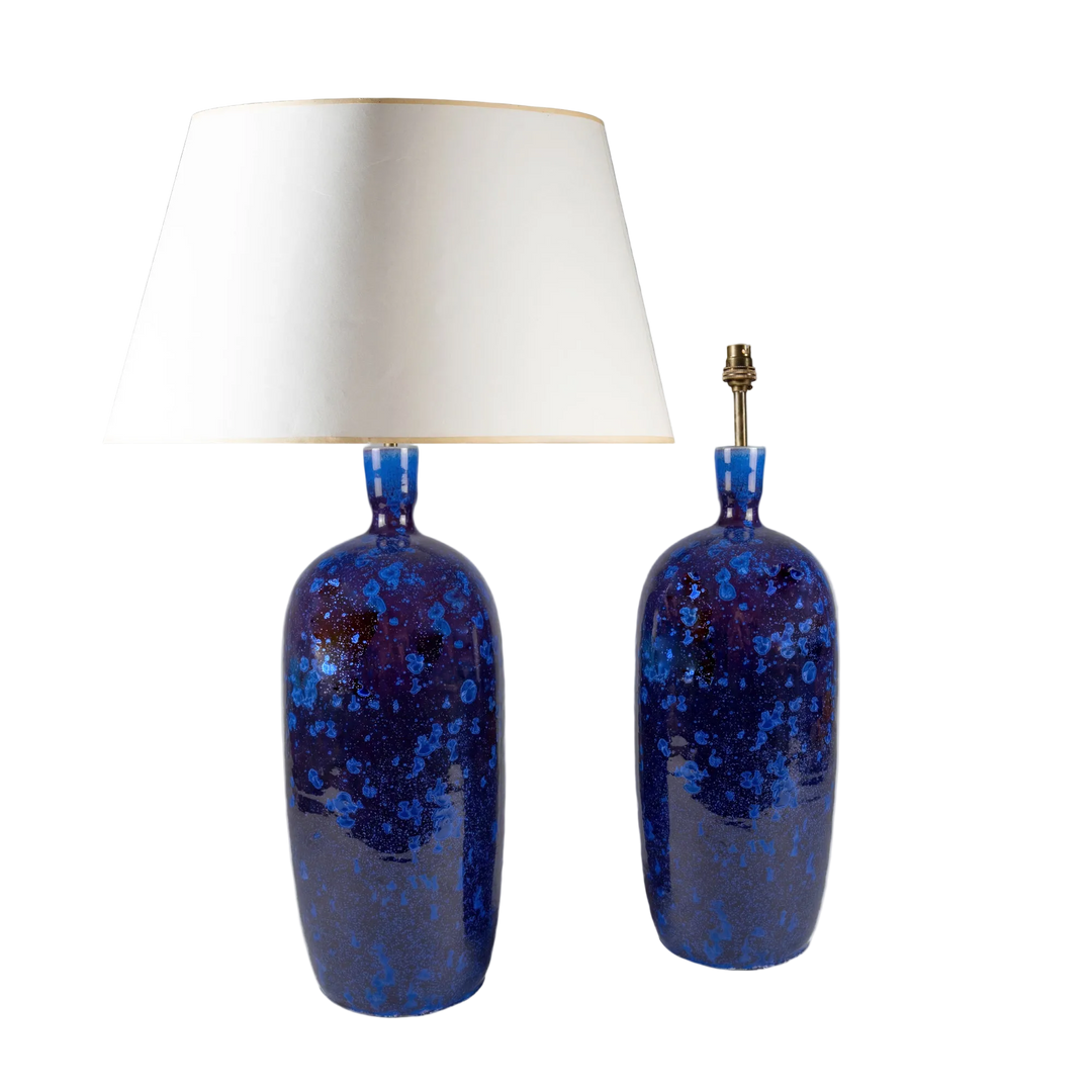 Pair of hand-crafted cobalt blue crystalline glazed ceramic table lamps by Nicholas Wells Antiques with white shades