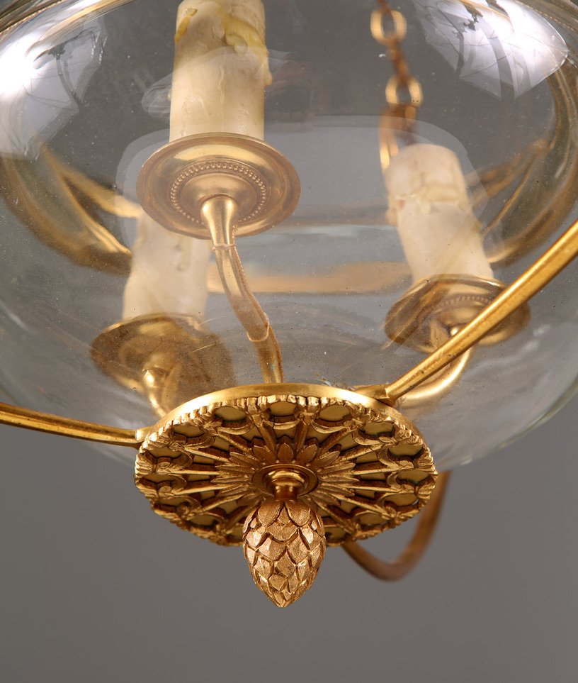A mid century gilt bronze and glass pendant glass lantern