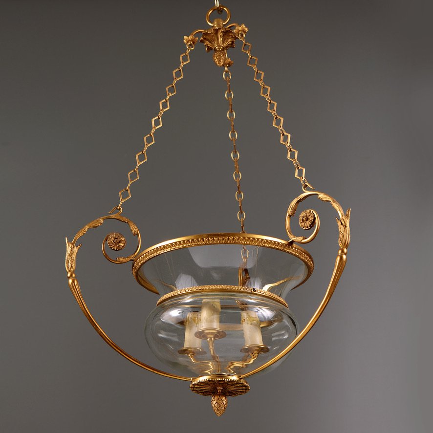 A mid century gilt bronze and glass pendant glass lantern