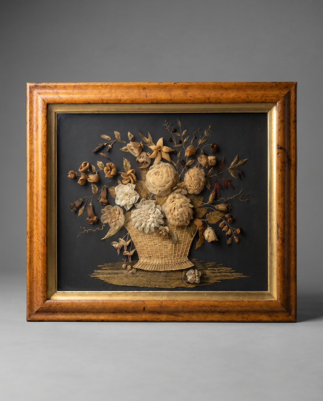 A woolwork relief picture of a basket of flowers