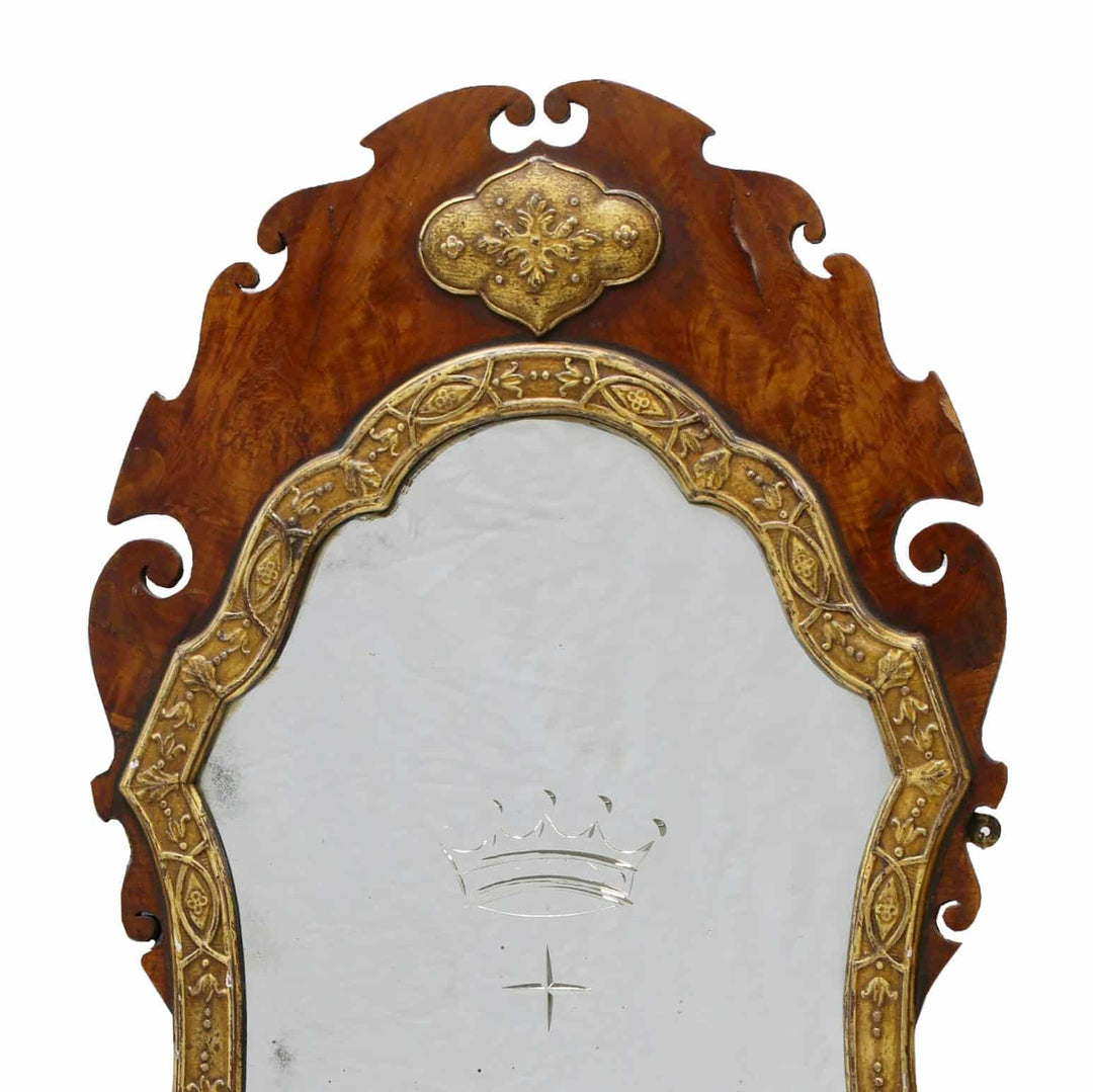 A George III flame veneered mahogany wall mirror