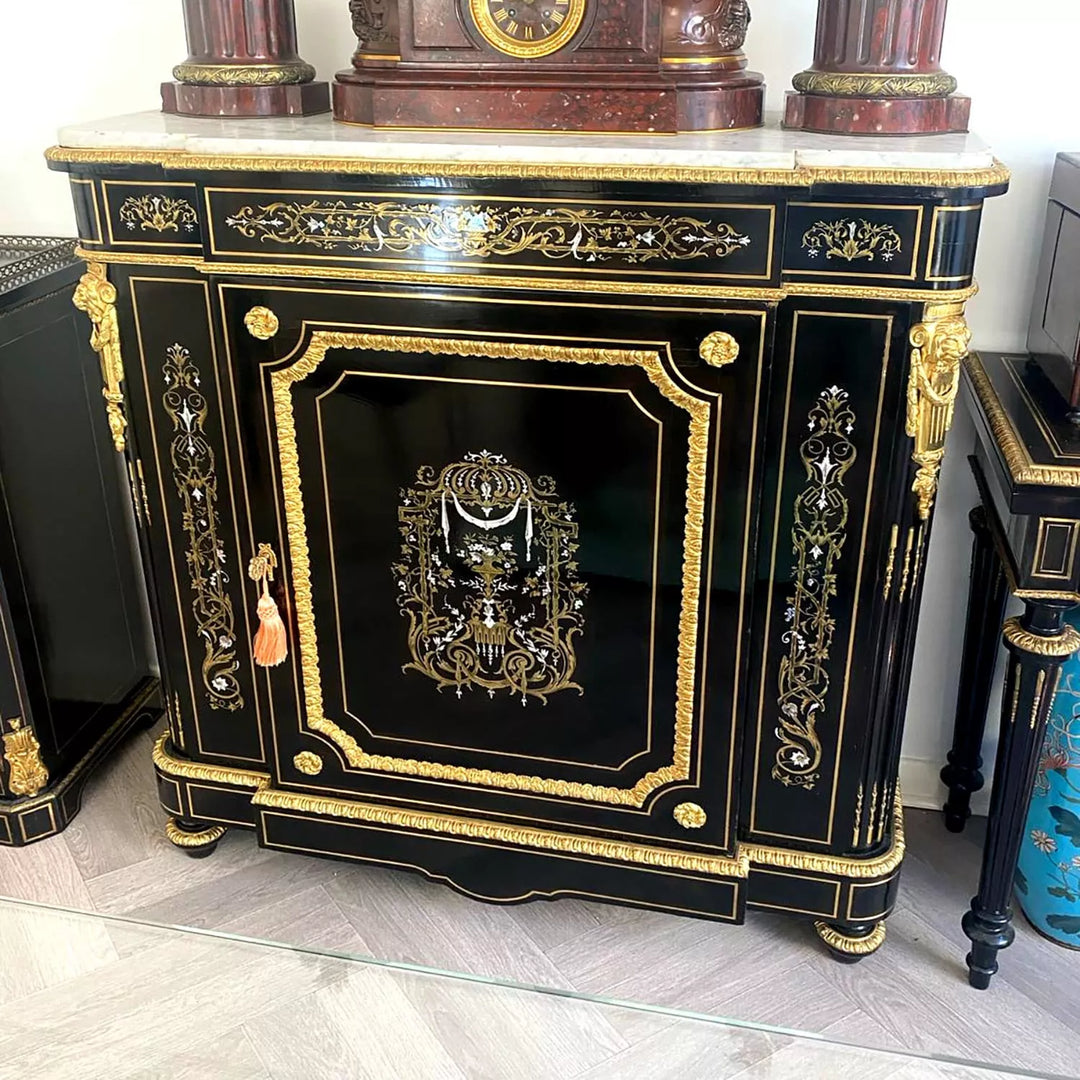 Mother of pearl inlaid ebonised cabinet