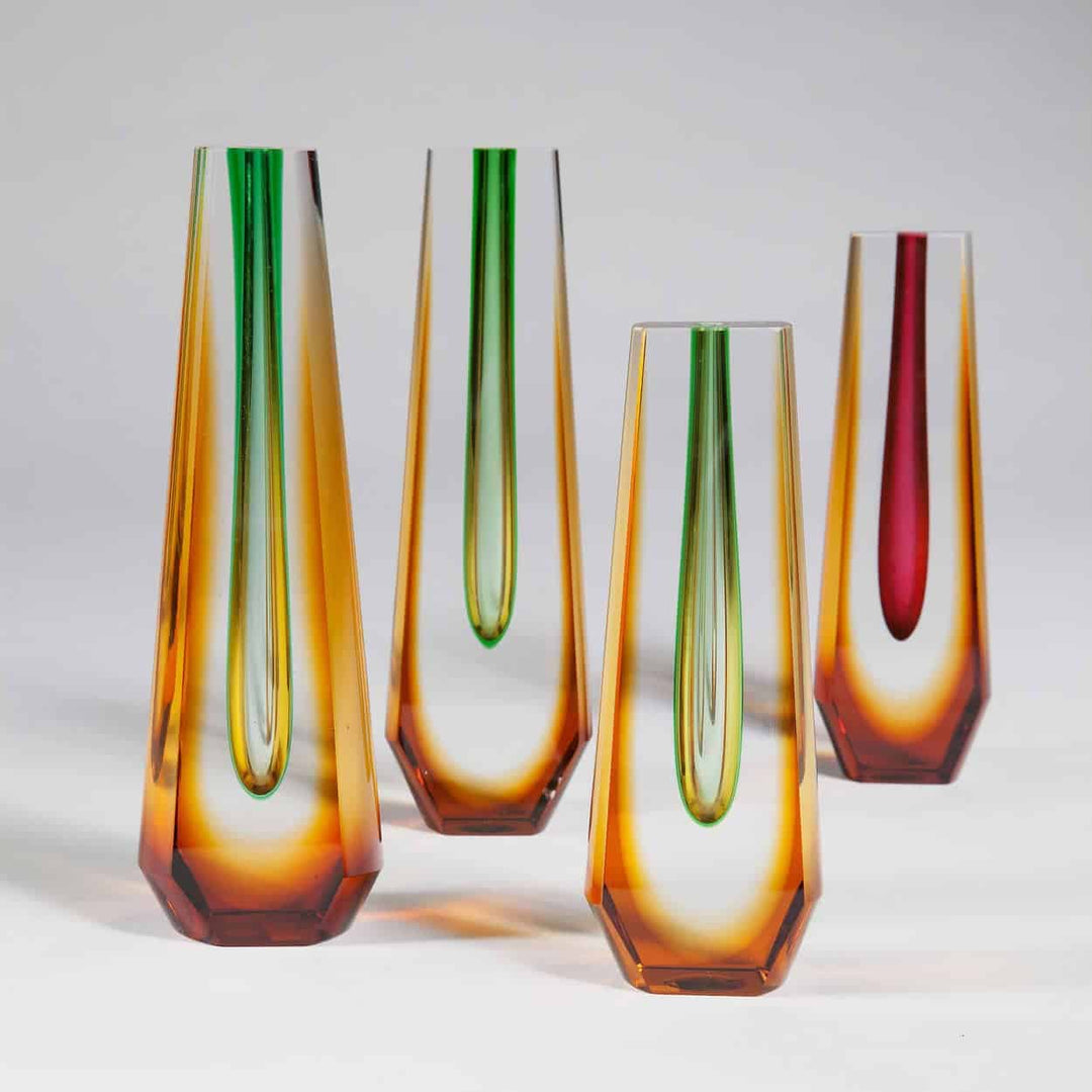 Seven Mid Century Bohemian Coloured Glass Vases