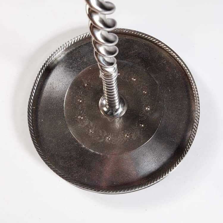 Polished and cut steel fire iron stand