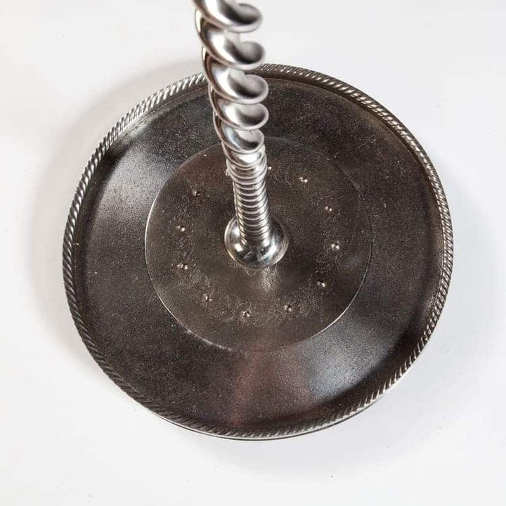 Polished and cut steel fire iron stand