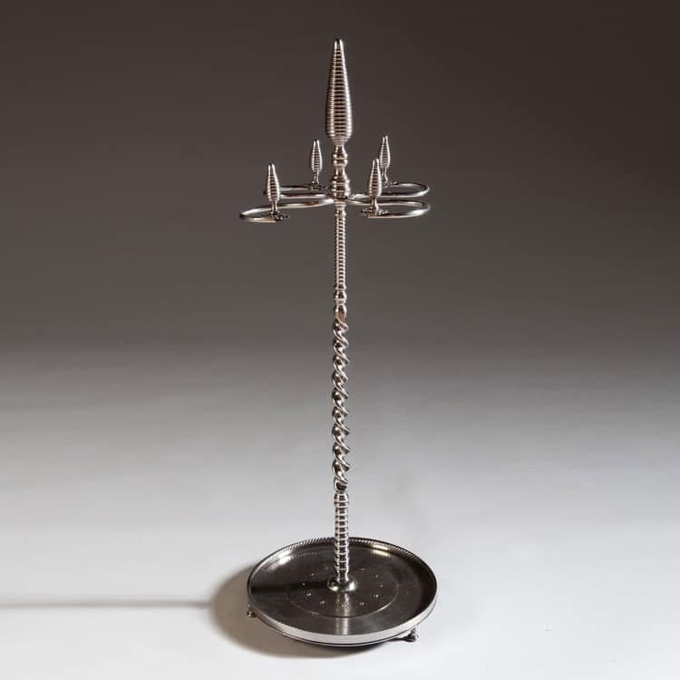 Polished and cut steel fire iron stand