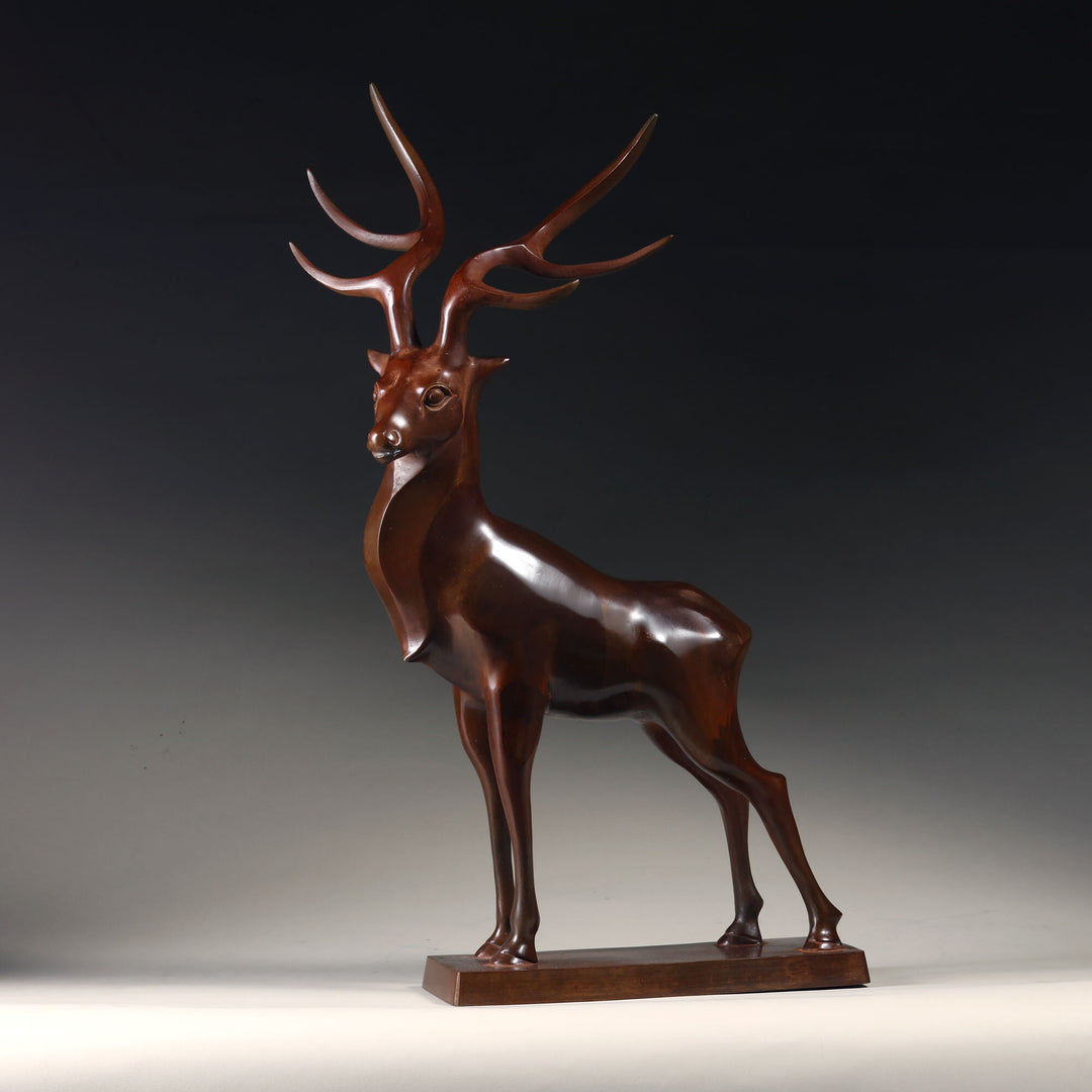 A Japanese bronze model of a Stag