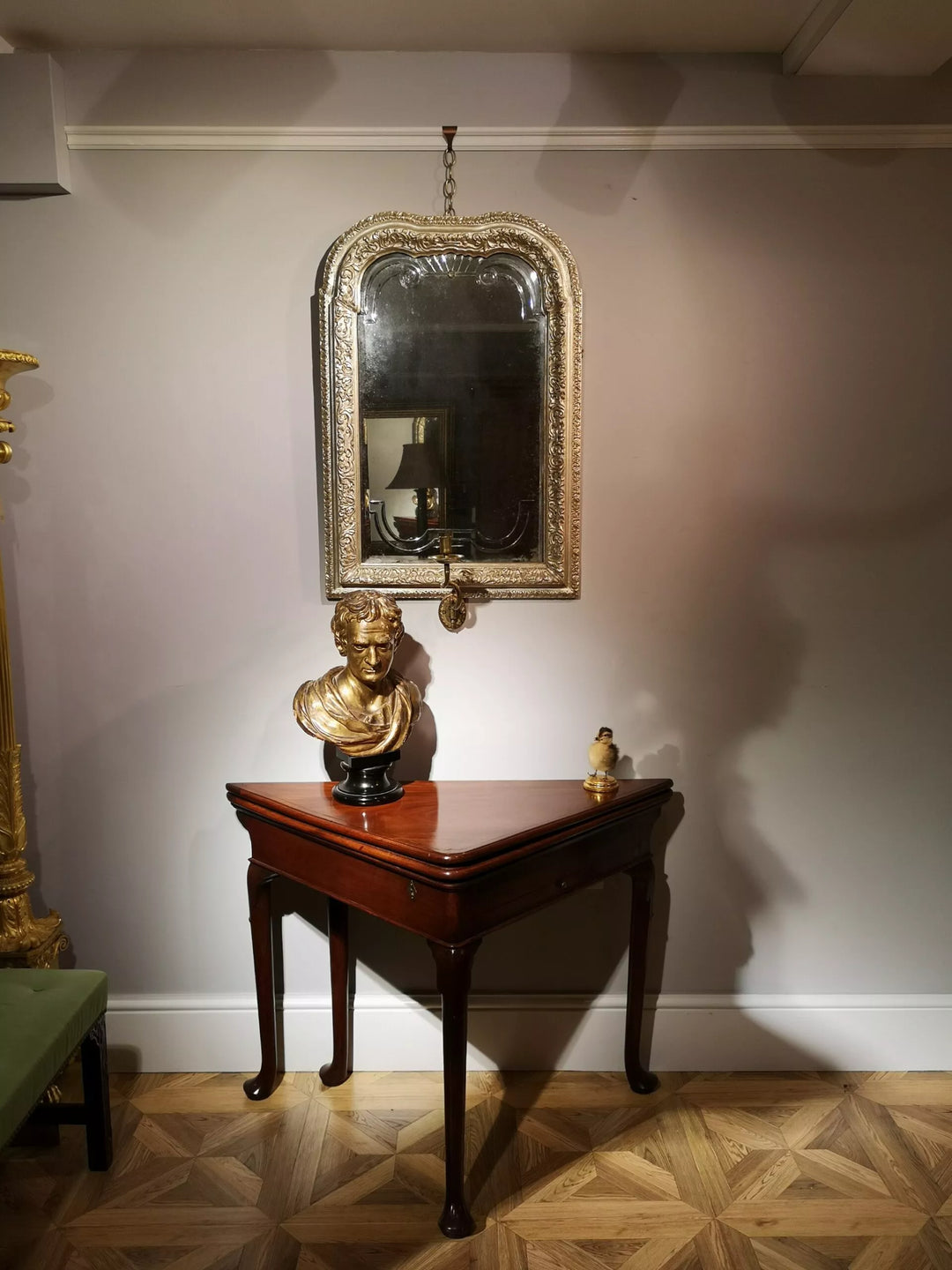 A Queen Anne Silvered Mirror Sconce 90x57cm with silvered bolection moulded frame and architectural engraving.