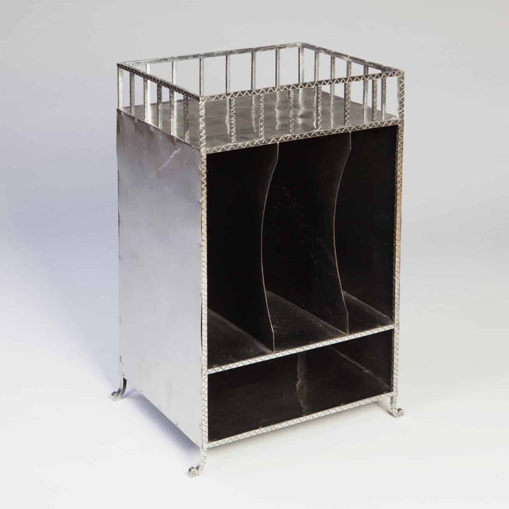 French Modernist Polished Steel Cabinet with cross-hatched gallery, three vertical divisions, shelf, and scroll legs.