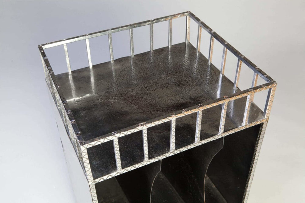 French Modernist Polished Steel Cabinet with cross-hatched gallery, three vertical divisions, and elegant scroll legs.