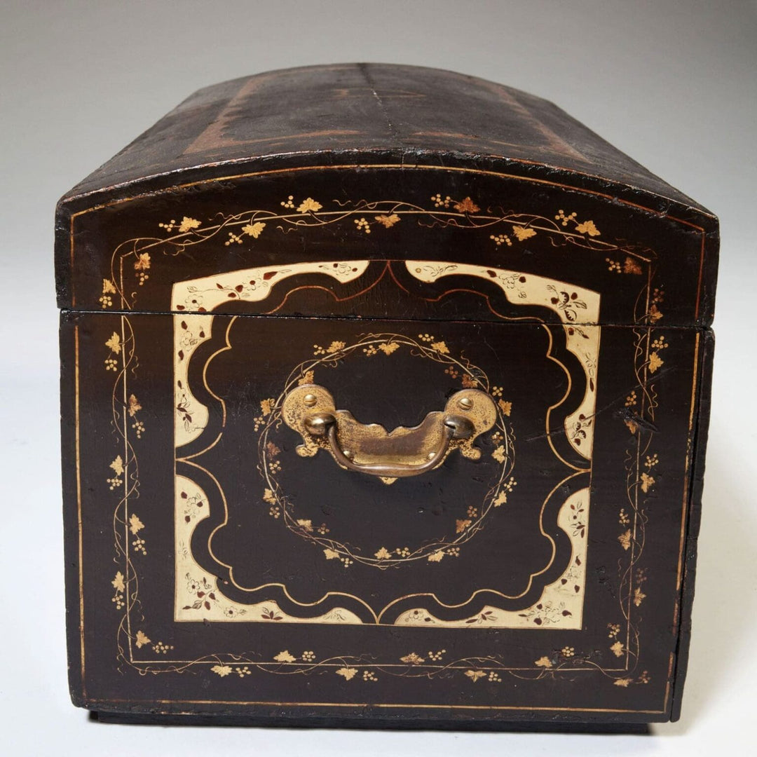 Chinese export Metamorphic Scholars Campaign Chest Desk with black lacquer and gold floral design circa 1800.