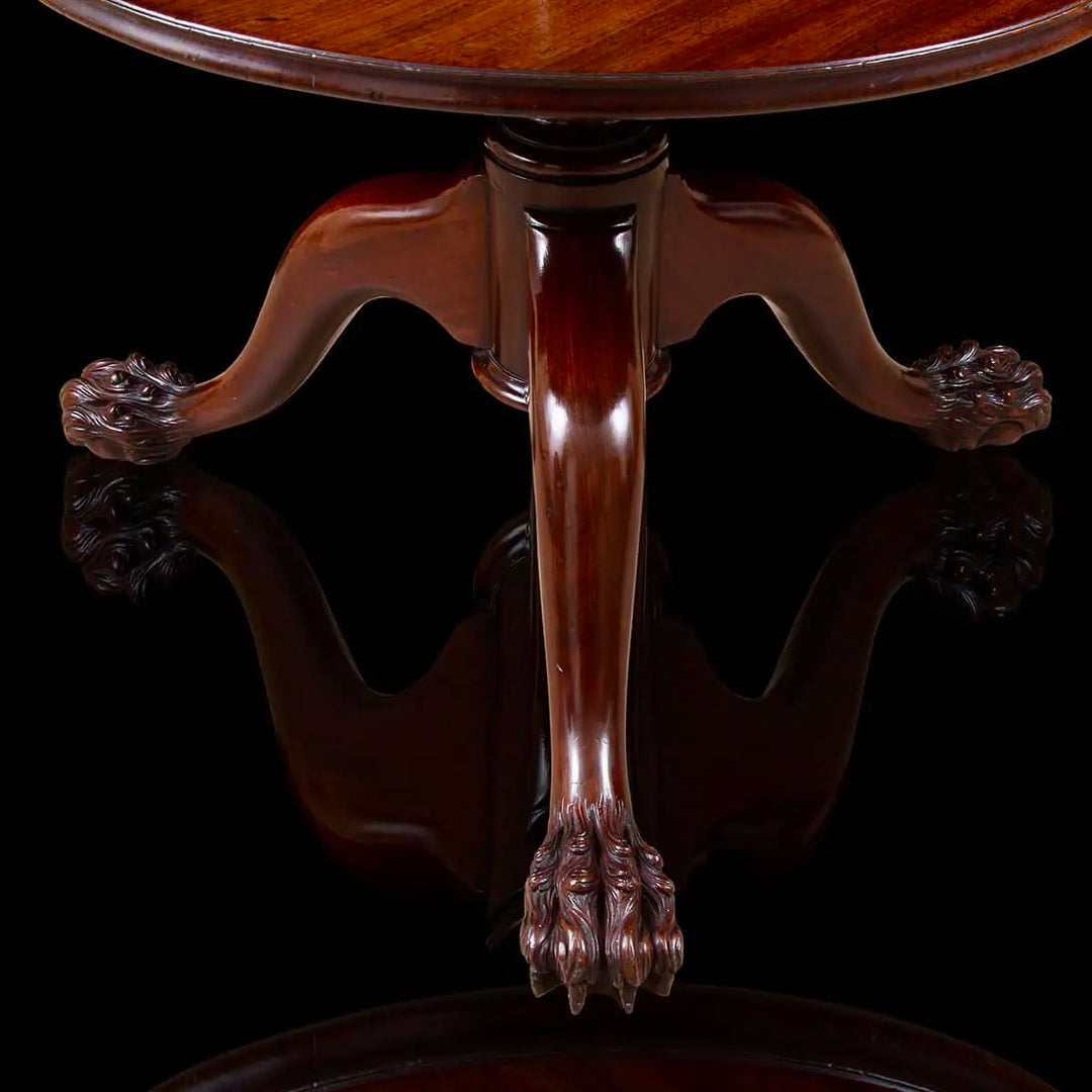 George II Mahogany Revolving Dumbwaiter showing detailed hairy paw feet and mid-18th century craftsmanship.