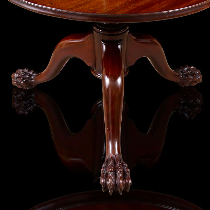 George II Mahogany Revolving Dumbwaiter showing detailed hairy paw feet and mid-18th century craftsmanship.