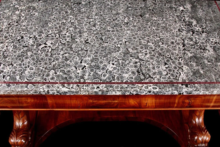 Italian Napoleonite & Figured Walnut Stylised Dolphin Console Tables with rare Corsican orbicular diorite tops and carved walnut dolphins.