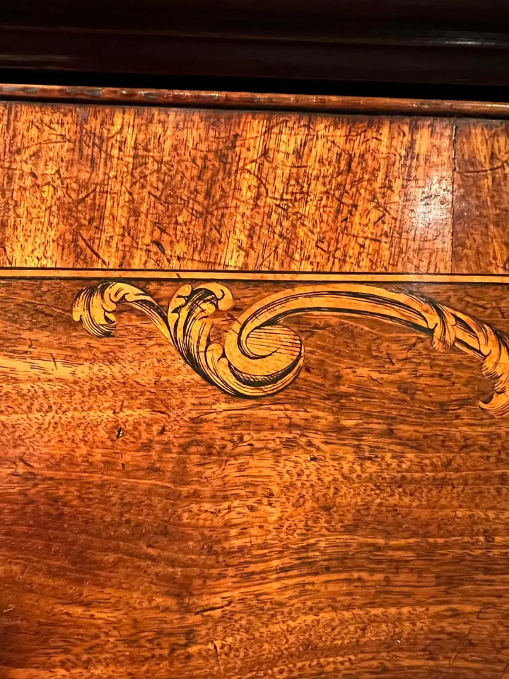 Ince and Mayhew George III Secretaire Breakfront Bookcase detailed mahogany marquetry panel close-up.