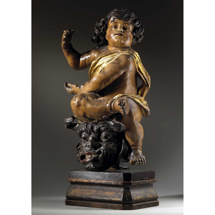 Pair of 17th Century North European Baroque Cherubs, carved wooden cherub with gilt drapery on ornate base circa 1640.