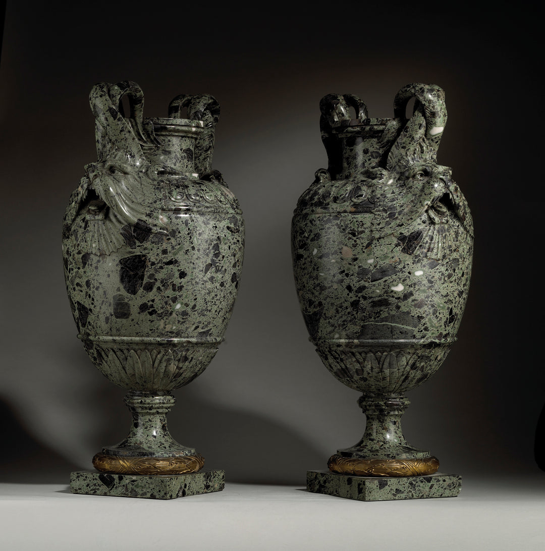 Pair of green marble vases