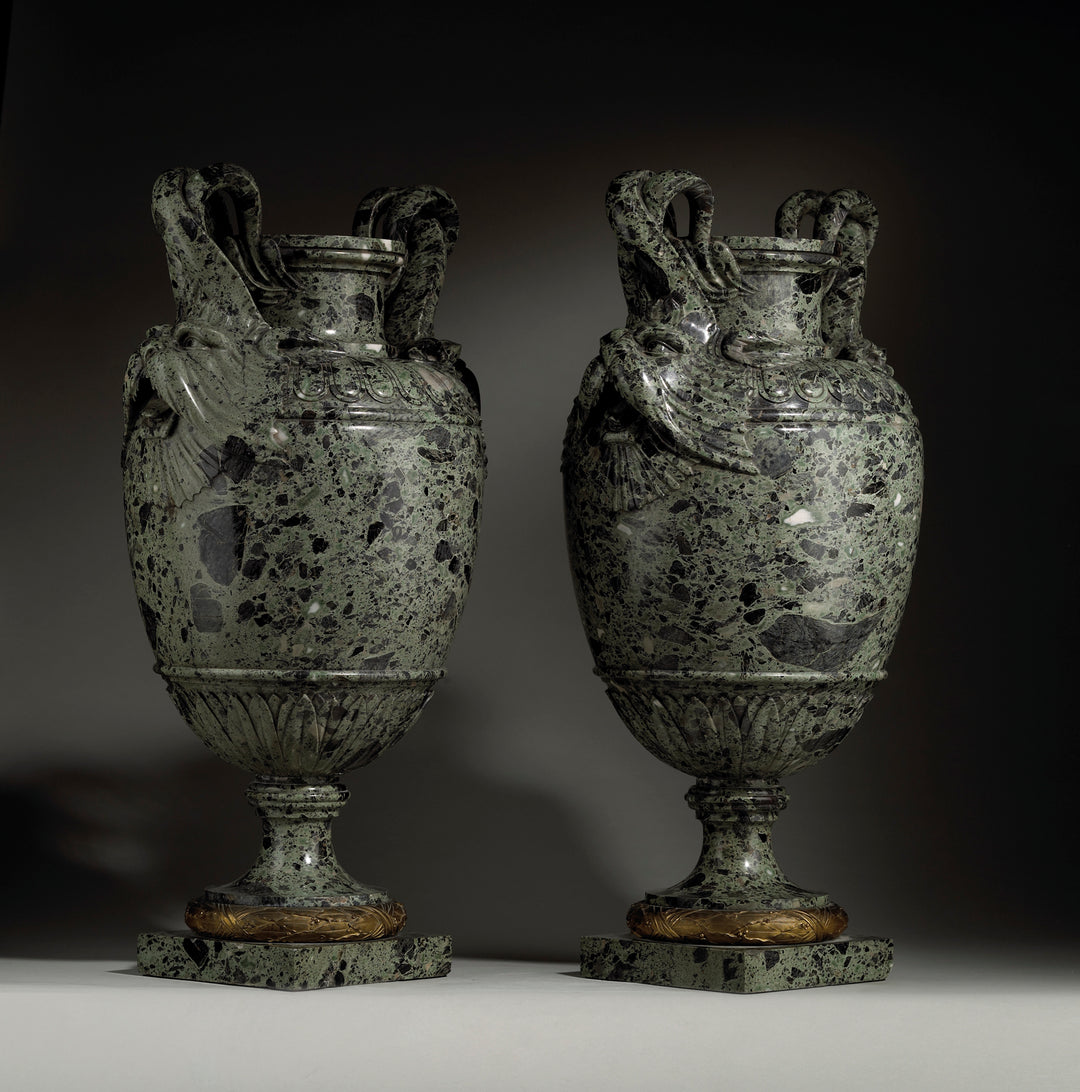 Pair of green marble vases