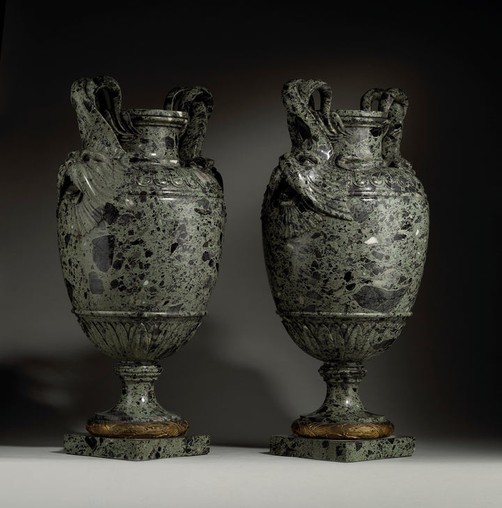 Pair of green marble vases