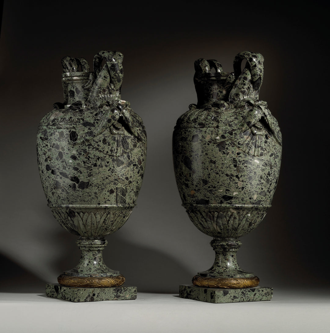 Pair of green marble vases
