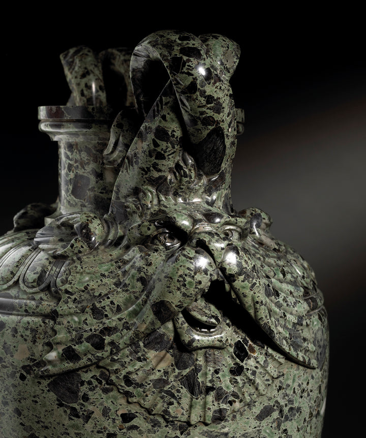 Pair of green marble vases