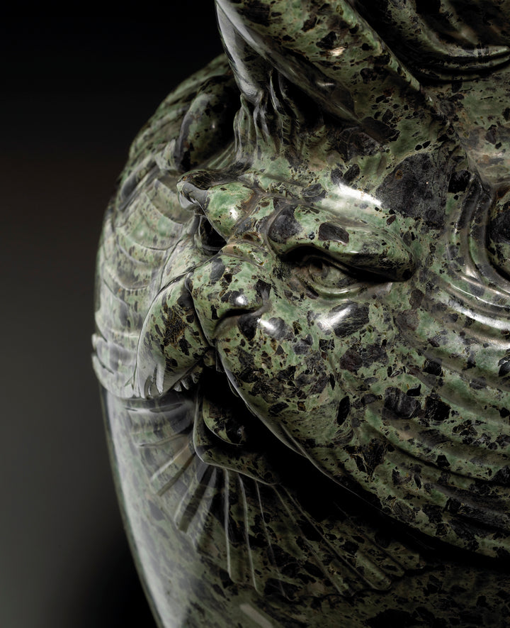 Pair of green marble vases