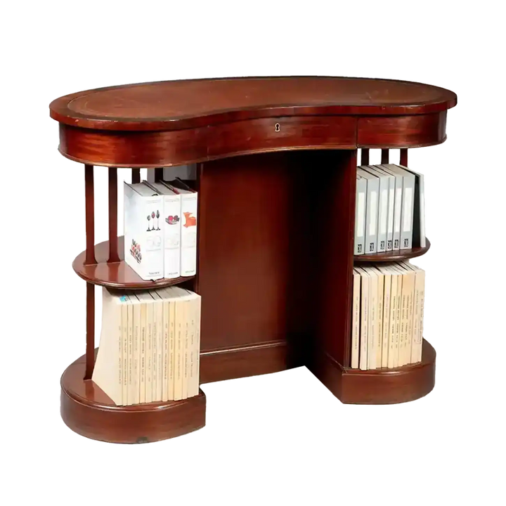 A very unusual Edwardian mahogany skeleton kidney desk with open tiered sides and original leather top.