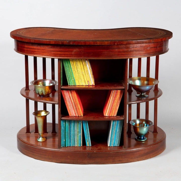 A very unusual Edwardian mahogany skeleton kidney desk with original leather top and open tiered sides circa 1910.