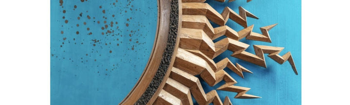 Zeus Mirror featuring large carved lightning bolts, antique central round mirror with sanded border by Andrew Allfree.