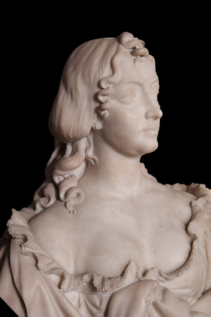 Napoleon III Marble Bust of a Lady carved from Carrara marble depicting an elegant 19th-century young woman.