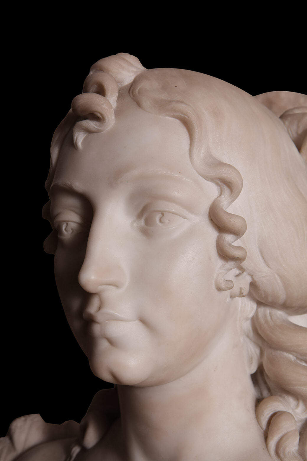 Napoleon III Marble Bust of a Lady, detailed Carrara marble sculpture of an elegant 19th-century young woman.